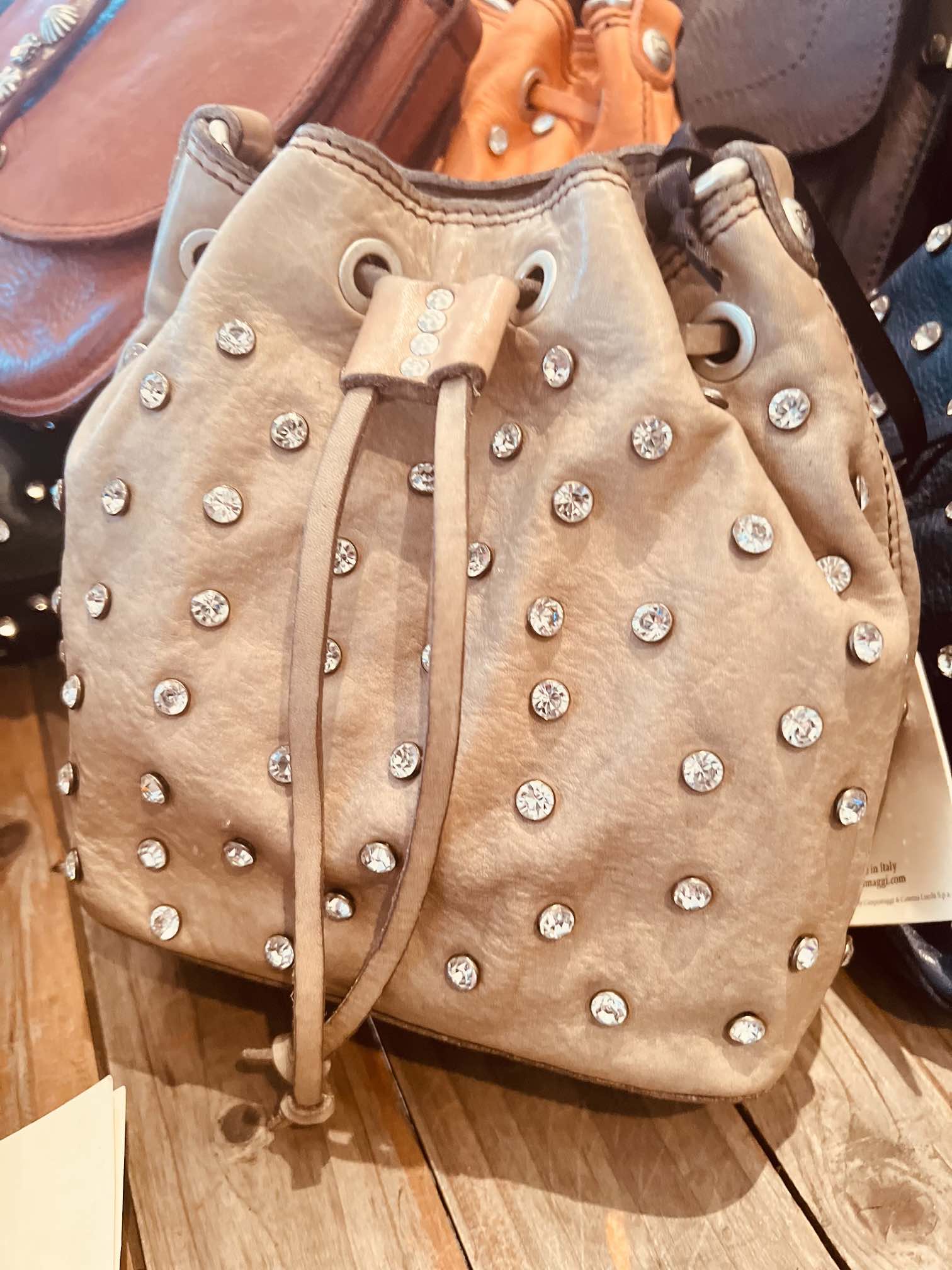 Campomaggi Italian Leather Bucket bag with studs Seccheiello Piccolo Strap Bucket bag in Ghiaccio It #C040890ND/X2785/C0539